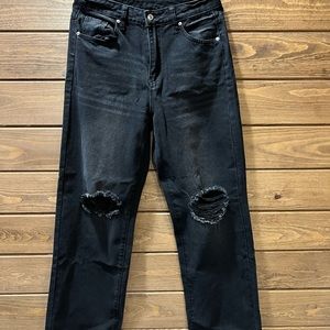 Brand new black jeans with holes in knees. Size Medium. Very cute and stylish